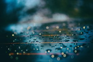 A close up of water droplets on glass