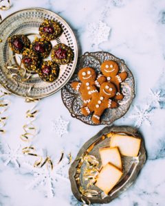 A table with cookies and other treats on it