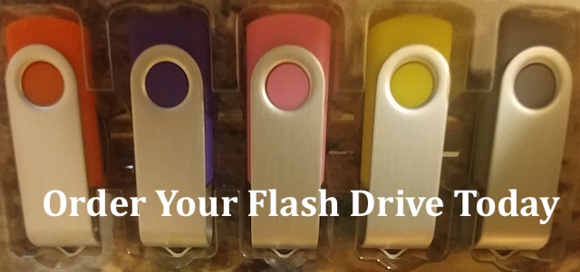 A group of three flash drives in different colors.