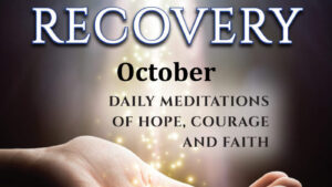 A hand is holding out its palm with the words " miracles of recovery " written on it.
