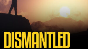 A person standing on top of a mountain with the sun in the background.